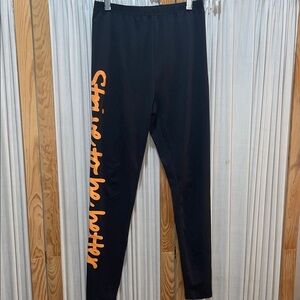 SHEIN Black Leggings with Vibrant Orange Text